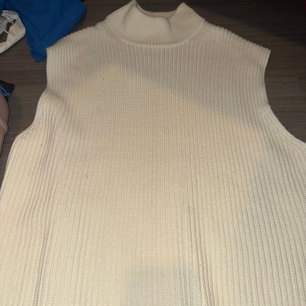 Cream Ribbed Sleeveless Turtleneck Sweater